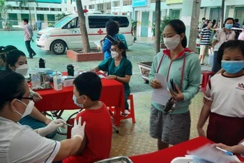 Thành phố Hồ Chí Minh tiêm vaccine phòng Covid-19 xuyên lễ Quốc khánh 2/9. (Ảnh minh họa)