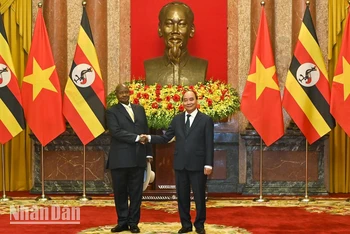 Chủ tịch nước Nguyễn Xuân Phúc và Tổng thống Uganda Yoweri Kaguta Museveni.
