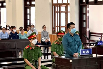 Bị cáo Nguyễn Quang Bình tại phiên tòa xét xử.