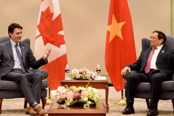 Thủ tướng Phạm Minh Chính gặp Thủ tướng Canada Justin Trudeau. (Ảnh: Thanh Giang)