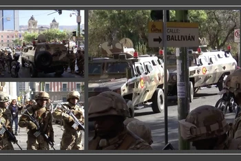Hình ảnh binh sỹ Bolivia tràn vào quảng trường Murillo ở La Paz. (Ảnh cắt từ clip của Reuters)
