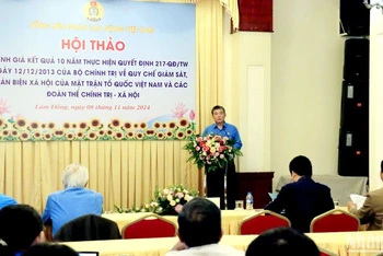 Đại diện Ban Chính sách-Pháp luật Tổng Liên đoàn Lao động Việt Nam phát biểu khai mạc hội thảo. 