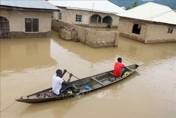 Cảnh ngập lụt sau những trận mưa lớn tại Lokoja, Nigeria. (Ảnh tư liệu: AFP/TTXVN)