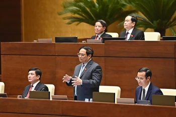Thủ tướng Chính phủ Phạm Minh Chính phát biểu tại phiên chất vấn của Quốc hội chiều 5/11. (Ảnh: ĐĂNG KHOA)