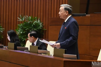 Bộ trưởng Công an Tô Lâm phát biểu giải trình, làm rõ ý kiến đại biểu Quốc hội nêu tại phiên thảo luận. (Ảnh: THỦY NGUYÊN)