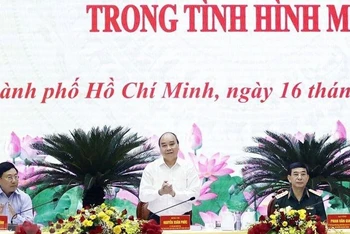 Chủ tịch nước Nguyễn Xuân Phúc tại Hội thảo. (Ảnh: Thống Nhất/TTXVN)