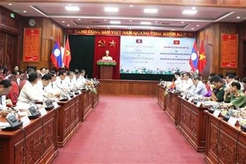 Quang cảnh cuộc hội đàm về tăng cường hợp tác giữa tỉnh Quảng Bình của Việt Nam và tỉnh Savannakhet của Lào, tại thành phố Đồng Hới ngày 19/6/2022. (Ảnh: Võ Dung/TTXVN)