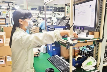 Hoạt động sản xuất của Công ty TNHH Datalogic Việt Nam (khu Công nghệ cao TP Hồ Chí Minh).