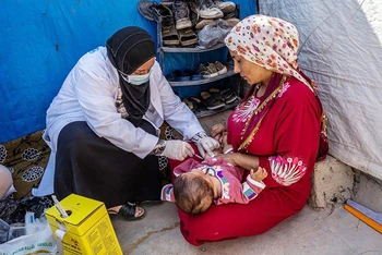 Tiêm vắc-xin cho trẻ em tại vùng Kurdistan, Iraq. (Ảnh UNICEF)