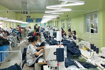 Sản xuất hàng dệt may tại Tổng công ty cổ phần Dệt may Nam Định.