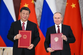 Tổng thống Nga Vladimir Putin và Tổng Bí thư, Chủ tịch Trung Quốc Tập Cận Bình. (Ảnh: TASS)