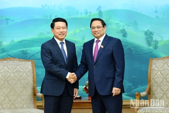 [Ảnh] Thủ tướng Phạm Minh Chính tiếp Phó Thủ tướng, Bộ trưởng Ngoại giao Lào