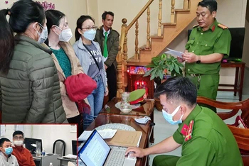 Lực lượng chức năng thực hiện lệnh bắt tạm giam đối với bà Hoa và ông Đạt.