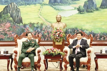 Tổng Bí thư, Chủ tịch nước Lào Thongloun Sisoulith và Thượng tướng Nguyễn Tân Cương tại buổi tiếp. Ảnh: Trịnh Dũng