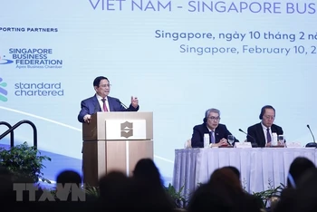 Thủ tướng Phạm Minh Chính phát biểu tại Diễn đàn Doanh nghiệp Việt Nam-Singapore. (Ảnh: TTXVN)
