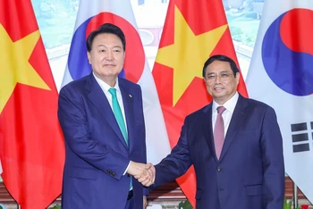 Thủ tướng Phạm Minh Chính hội kiến Tổng thống Hàn Quốc Yoon Suk Yeol nhân chuyến thăm cấp nhà nước tới Việt Nam tháng 6/2023. (Ảnh: VPG)