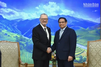 Thủ tướng Phạm Minh Chính và ông Michael Michalak, Phó Chủ tịch cấp cao kiêm Giám đốc điều hành khu vực của Hội đồng Kinh doanh Hoa Kỳ-ASEAN (USABC). (Ảnh: TRẦN HẢI)
