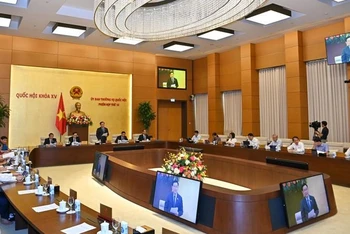 Quang cảnh phiên họp thứ 14 của Ủy ban Thường vụ Quốc hội. 
