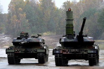 Cuộc xung đột Nga-Ukraine khiến các nước châu Âu gia tăng mua sắm quốc phòng. (Ảnh: AFP/TTXVN)