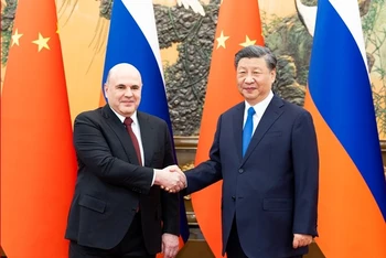 Chủ tịch Trung Quốc Tập Cận Bình tiếp Thủ tướng Nga Mikhail Mishustin. (Ảnh: Tân Hoa Xã)