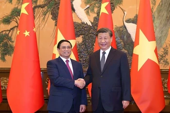 Thủ tướng Phạm Minh Chính và Tổng Bí thư, Chủ tịch nước Trung Quốc Tập Cận Bình.