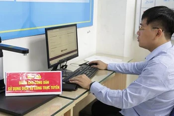 Thí điểm 2 nhóm dịch vụ công liên thông liên quan đến bảo hiểm xã hội, bảo hiểm y tế tại phường Trần Hưng Đạo, Hà Nội. (Ảnh: Tâm Trung)
