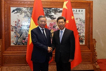 Bộ trưởng Tô Lâm và đồng chí Trần Văn Thanh. (Ảnh: MPS)