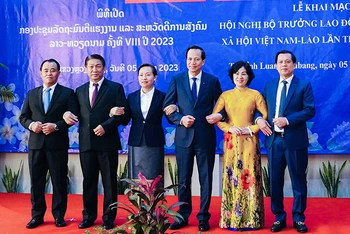 Các đại biểu tại lễ khai mạc Hội nghị Bộ trưởng Lao động và Phúc lợi xã hội Lào-Việt Nam lần thứ tám. (Ảnh: Dân trí)