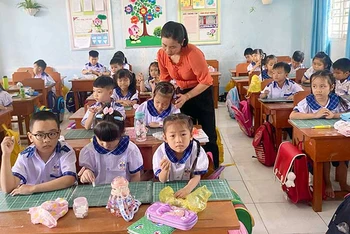 Học sinh Trường tiểu học Mỹ Hiệp, huyện Cao Lãnh, tỉnh Đồng Tháp trong ngày tựu trường.
