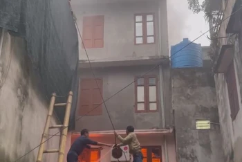 Hiện trường vụ cháy rạng sáng 2/2 tại một ngôi nhà 3 tầng thuộc phường Bồ Xuyên (thành phố Thái Bình).
