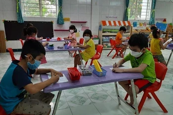 Học sinh Trường Mầm non Tuổi thơ 7, quận 3, Thành phố Hồ Chí Minh trong giờ học.