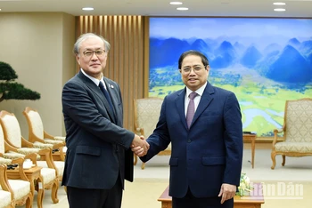 Thủ tướng Phạm Minh Chính và Tổng Thư ký Ban An ninh quốc gia Nhật Bản Akiba Takeo.