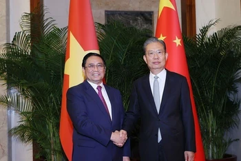 Thủ tướng Phạm Minh Chính hội kiến Ủy viên trưởng Nhân đại Toàn quốc Trung Quốc Triệu Lạc Tế. 