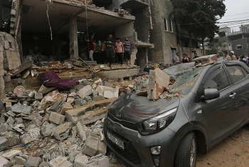 Các tòa nhà bị phá hủy sau cuộc không kích Israel xuống Rafah, Dải Gaza, ngày 29/10. (Ảnh: THX/TTXVN)