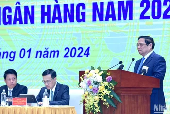 [Ảnh] Thủ tướng dự Hội nghị triển khai nhiệm vụ ngành ngân hàng năm 2024