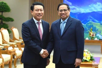 Thủ tướng Phạm Minh Chính đón Phó Thủ tướng, Bộ trưởng Ngoại giao Lào Saleumxay Kommasith.