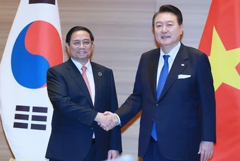 Thủ tướng Phạm Minh Chính và Tổng thống Hàn Quốc Yoon Suk Yeol. (Ảnh: Dương Giang)