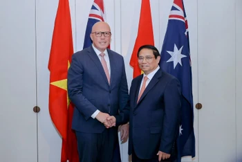 Thủ tướng Chính phủ Phạm Minh Chính và lãnh đạo Đảng Tự do Australia Peter Dutto.