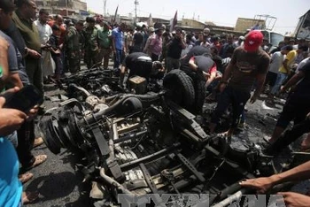 Hiện trường vụ đánh bom xe ở Sadr City, Iraq. (Ảnh tư liệu - minh họa: AFP/TTXVN)