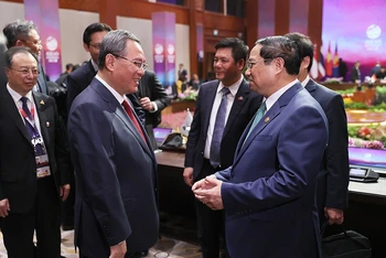 Thủ tướng Chính phủ Phạm Minh Chính và Thủ tướng Trung Quốc Lý Cường. (Ảnh: DƯƠNG GIANG)