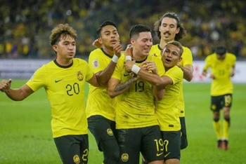 Các cầu thủ Malaysia ăn mừng bàn mở tỷ số trước Lào. (Ảnh: AFF)
