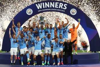 Man City lần đầu vô địch Cúp C1 châu Âu đồng thời hoàn tất cú ăn ba ở mùa giải này, sau khi đã đăng quang tại Ngoại hạng Anh và Cúp FA. (Ảnh: Reuters)
