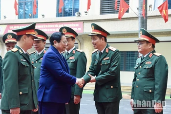 [Ảnh] Thủ tướng Phạm Minh Chính thăm, chúc Tết Trường Đại học Văn hóa-Nghệ thuật Quân đội 