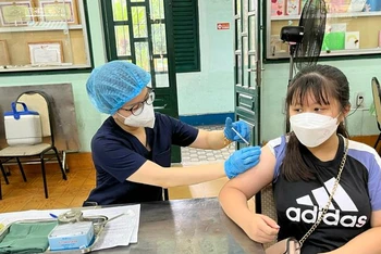 Tiêm vaccine phòng Covid-19 cho trẻ em từ 5 đến dưới 12 tuổi tại quận 5, Thành phố Hồ Chí Minh vào tháng 4/2022.
