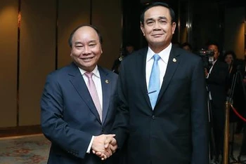 Thủ tướng Nguyễn Xuân Phúc và Thủ tướng Thái Lan Prayut Chan-o-cha. (Ảnh: VGP/Quang Hiếu)