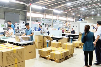 Một cơ sở sản xuất, kinh doanh ở Bắc Ninh phục hồi nhờ được giảm thuế và lãi suất. 