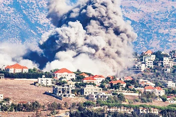 Một ngôi làng ở Liban sau trận không kích của Israel. 