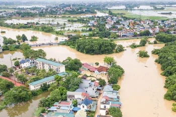 Ngập úng tại Thị trấn Xuân Mai, huyện Chương Mỹ, Hà Nội. 