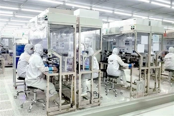 Trong 35 năm qua, khu vực đầu tư nước ngoài đã đóng góp tích cực vào thành tựu tăng trưởng, phát triển và hội nhập kinh tế thế giới của Việt Nam. (Ảnh minh hoạ: TTXVN)