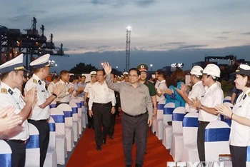 Thủ tướng Phạm Minh Chính dự Lễ phát lệnh làm hàng đầu năm của Tổng Công ty Tân Cảng Sài Gòn. (Ảnh: TTXVN)